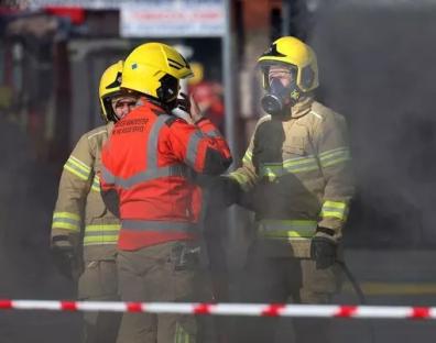 Firefighters at a large fire.