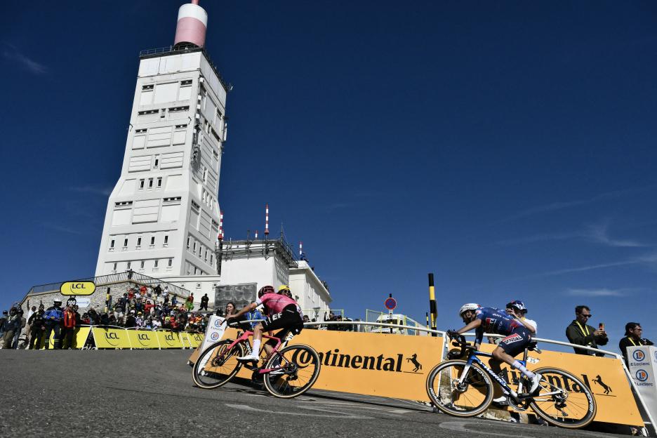 Two cyclists racing up Mont Ventoux during the Tour de France.