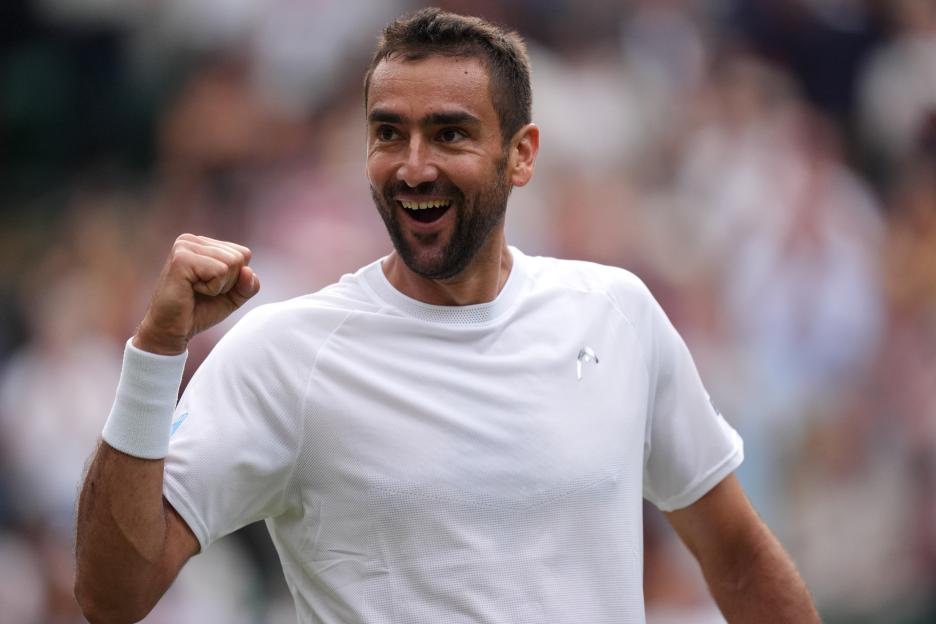 Marin Cilic celebrates a victory at Wimbledon.