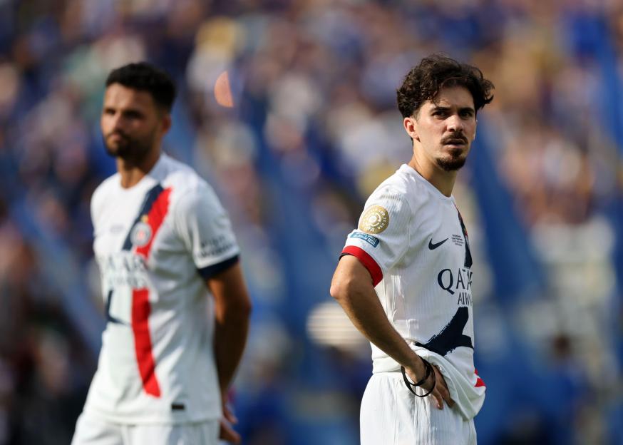 Vitinha of PSG looking dejected during a soccer match.