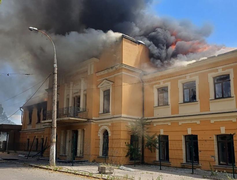 Building in Kherson on fire after a Russian drone attack.