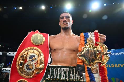 Jai Opetaia of Australia holding his IBF and The Ring cruiserweight world title belts.