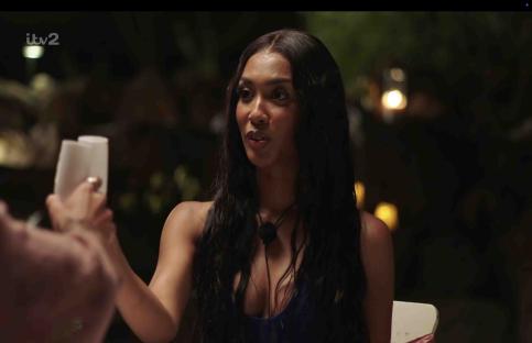 Screenshot from Love Island showing Malisha and Harrison on a date.