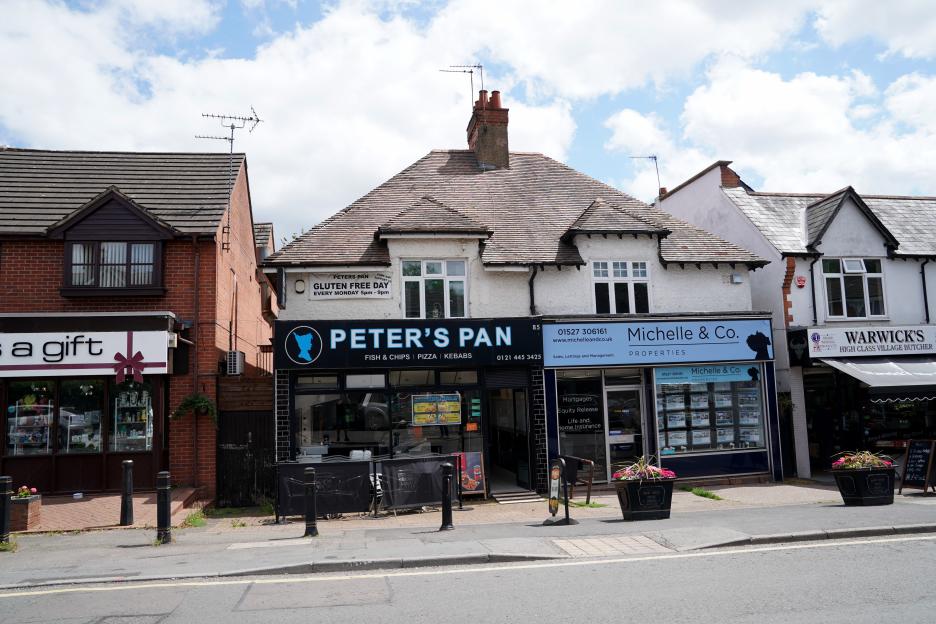 Photo of a row of shops in Barnt Green village, including Peter's Pan takeaway and Michelle & Co. properties.