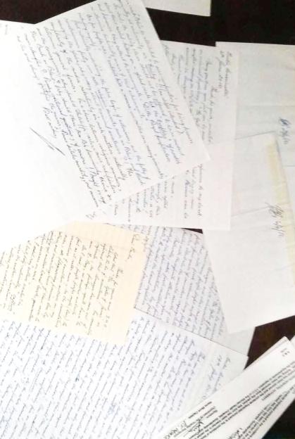 Handwritten letters with varying inks and fonts.