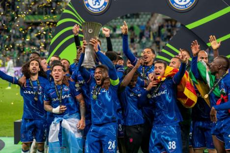 Chelsea FC players celebrating their UEFA Conference League Final victory.
