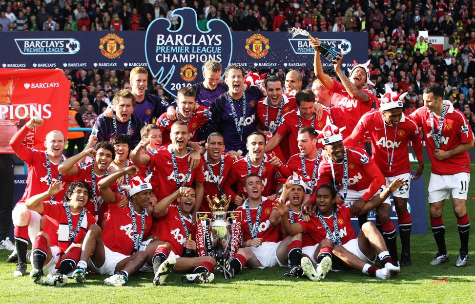 Manchester United team celebrating Premier League victory.