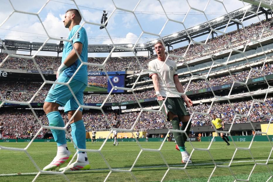 Cole Palmer reacts after a missed goal during a soccer match.
