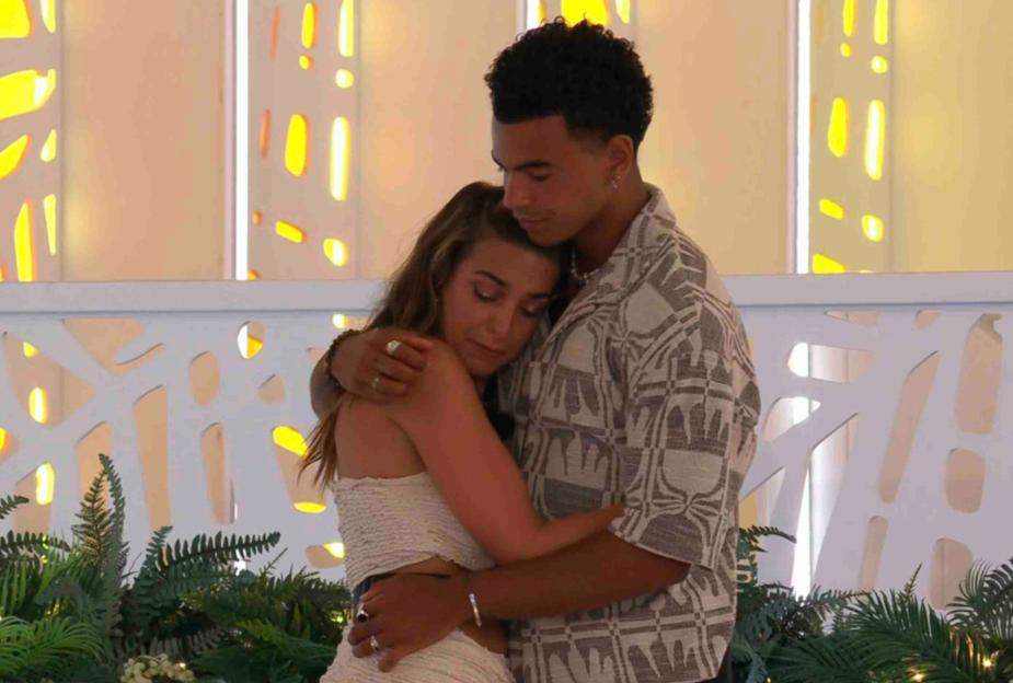 Couple embracing.