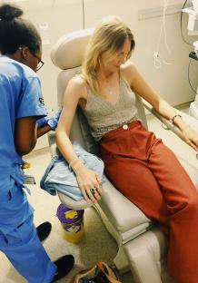 Woman receiving cancer treatment in a hospital.