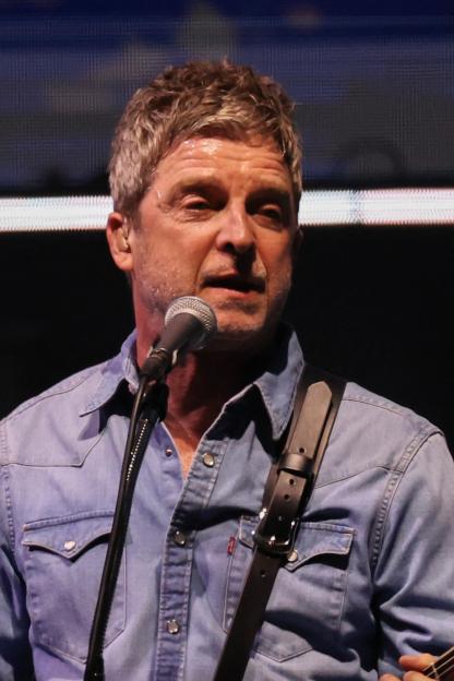 Noel Gallagher of Oasis performing live.