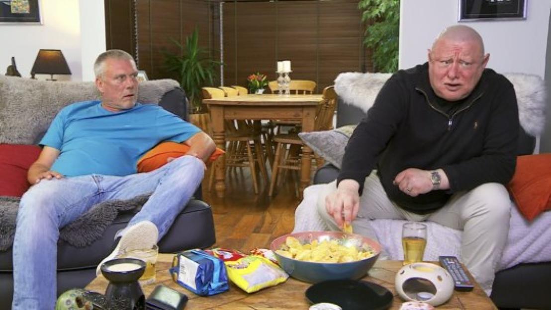 Shaun Ryder and Bez of Celebrity Gogglebox watching television.