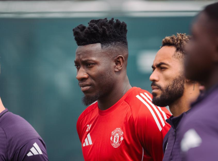 Andre Onana and Matheus Cunha of Manchester United at a training session.