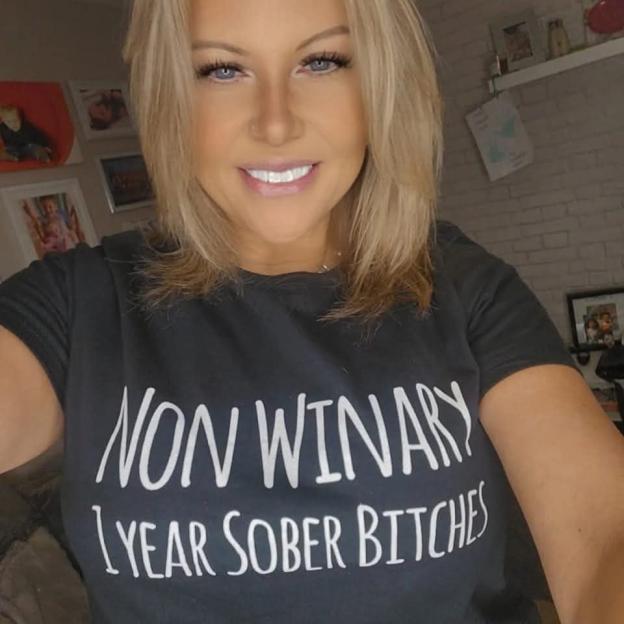 Woman wearing a shirt that says 