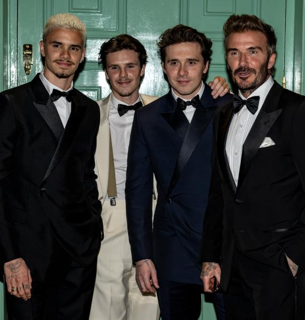 David Beckham with his sons, Romeo, Cruz, and Brooklyn, at a birthday event.