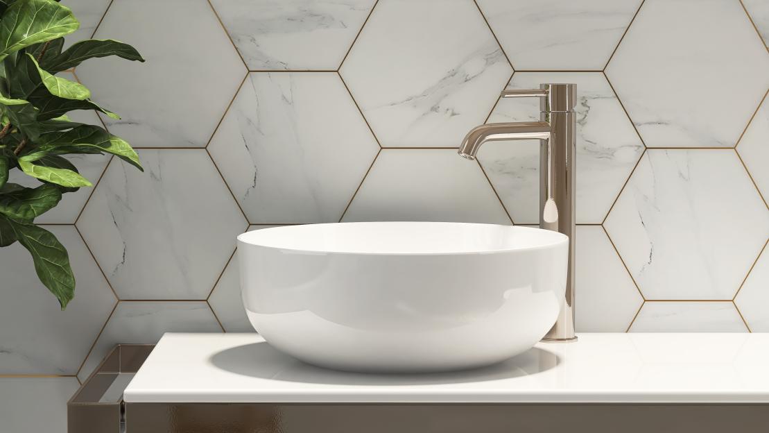 Modern bathroom vanity with white sink and gold accents.