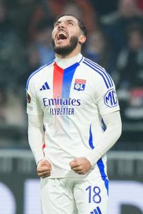Rayan Cherki of Lyon celebrating a goal.