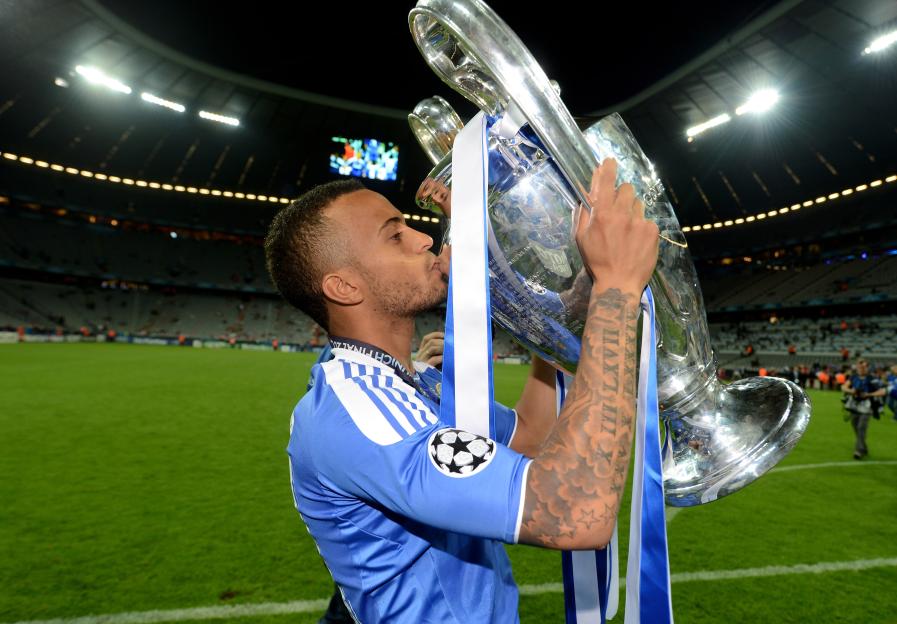 Ryan Bertrand of Chelsea kissing the UEFA Champions League trophy.