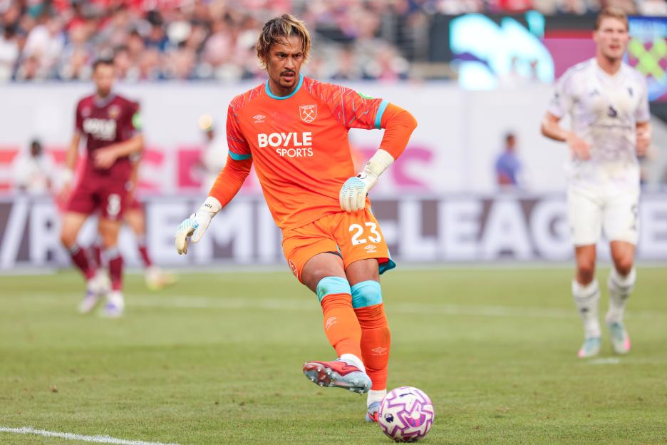 Alphonse Areola #23 of West Ham United kicks the soccer ball.
