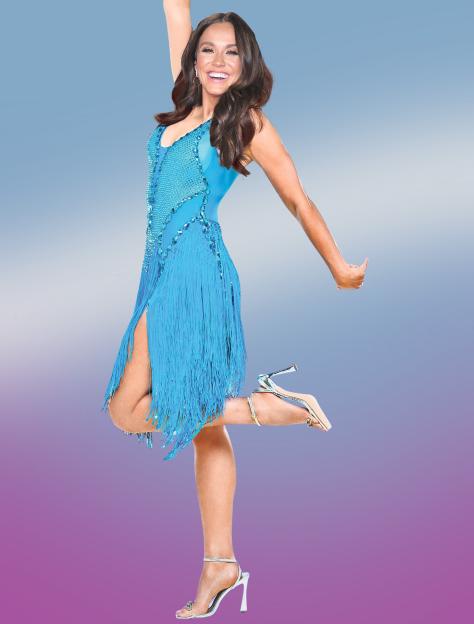 Woman in a blue fringed dress and heels.