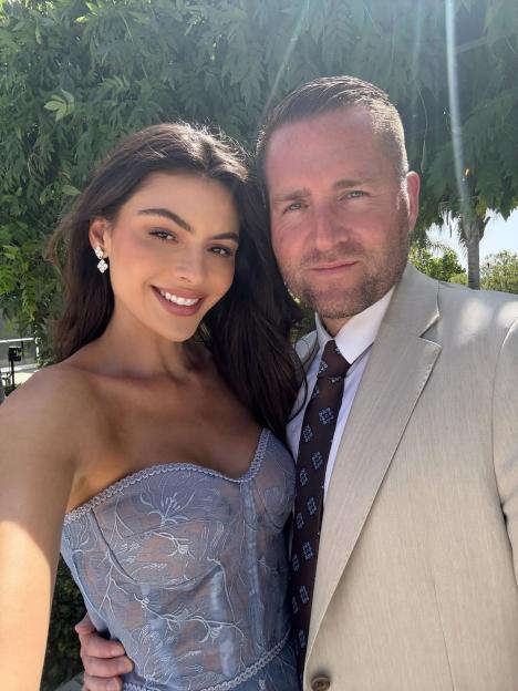 Nathalia Campos and her boyfriend at a wedding.