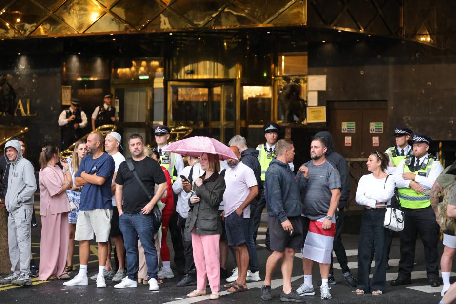 Protestors outside a hotel in London.