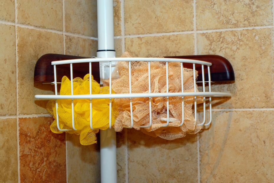 Shower caddy with two bath poufs.