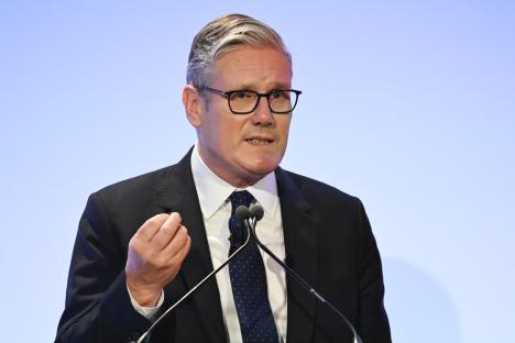 Keir Starmer speaking at a conference.