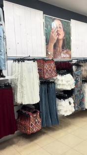 Primark clothing display featuring Rita Ora's summer collection.