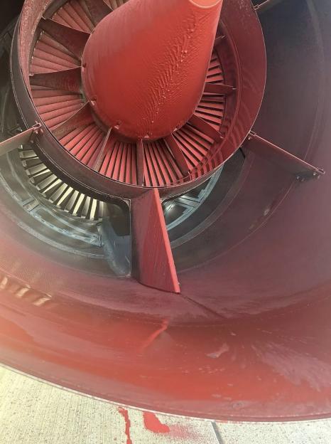 Red paint on a military aircraft engine.