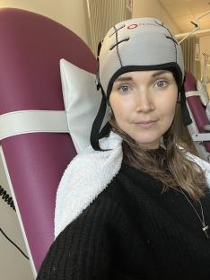 Woman wearing a cold cap during chemotherapy.