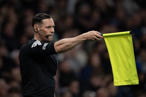 LONDON, ENGLAND - APRIL 21: The linesman raises his flag for offside during the Premier League match between Tottenham Hotspur FC and Nottingham Forest FC at Tottenham Hotspur Stadium on April 21, 2025 in London, England. (Photo by Visionhaus/Getty Images)