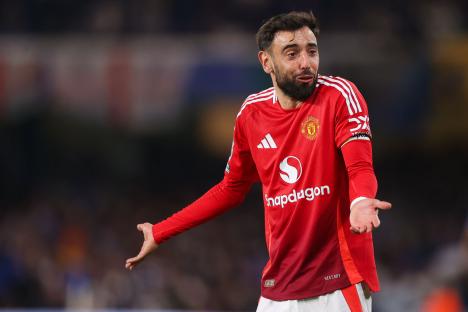 Bruno Fernandes of Manchester United arguing with a referee.
