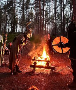 Police raid a Russian forest ceremony.