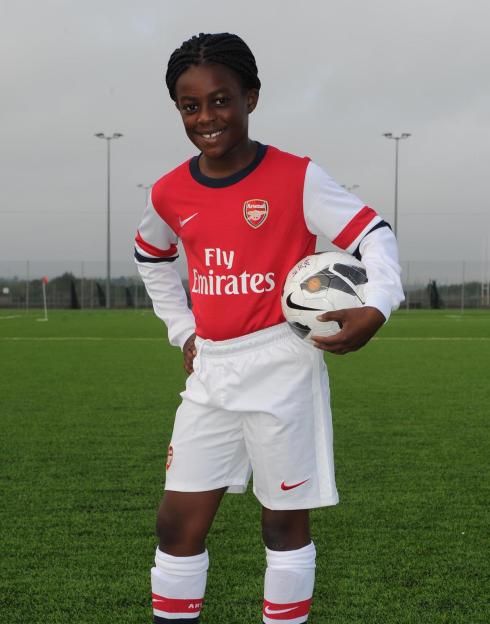 Michelle Agyemang of Arsenal Women's Academy holding a soccer ball.