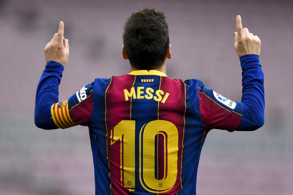Lionel Messi celebrating after scoring a goal.