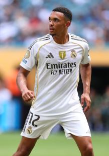 Soccer player in Real Madrid uniform.