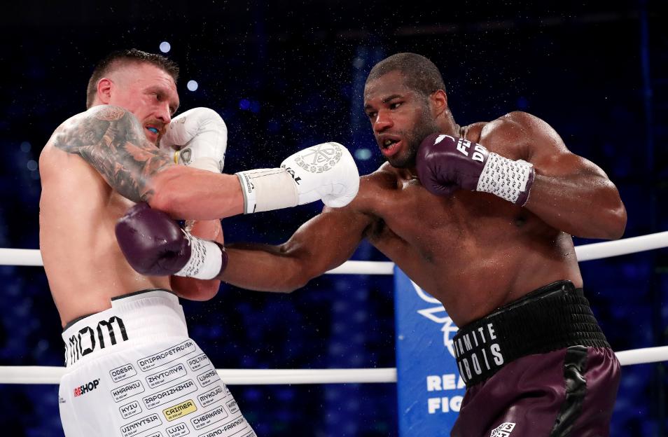 Oleksandr Usyk and Daniel Dubois boxing.
