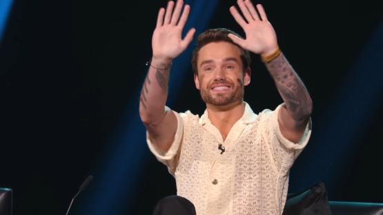Liam Payne waving on the set of Building the Band.