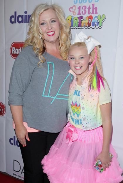 HOLLYWOOD, CA - MAY 16: (L-R) Jessalynn Siwa and dancer JoJo Siwa on the red carpet at JoJo Siwa from