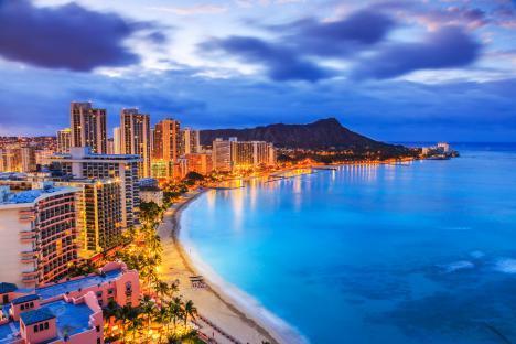 Honolulu skyline at dusk, Waikiki Beach, Diamond Head volcano.