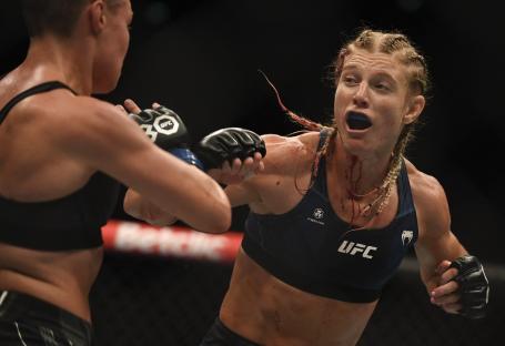(FILES) French mixed martial arts fighter Manon Fiorot (R) fights against US mixed martial arts fighter Rose Namajunas (L) on the octogone during their UFC Lightweight bout at The Accor Arena in Paris, on September 2, 2023. MMA fighter Manon Fiorot faces Kirghiz fighter Valentina Shevchenko at the UFC 315 bout on May 10, 2025 in Montreal, with a chance to make history should she win the world belt - a first for French MMA. (Photo by JULIEN DE ROSA / AFP) (Photo by JULIEN DE ROSA/AFP via Getty Images)
