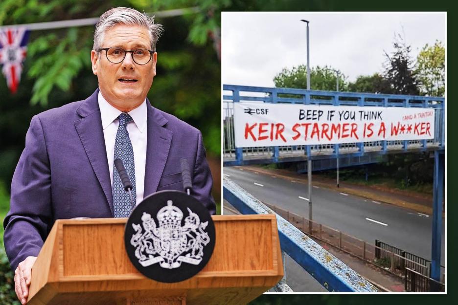 Keir Starmer speaking at a podium next to a photo of a banner calling him a "w***ker".