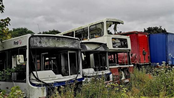 Look inside vintage motor graveyard where nostalgic 90s buses & long-forgotten Royal Mail wagon are left to rot