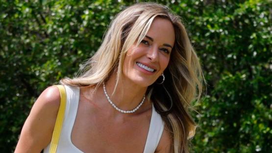 Jena Sims stuns in bold outfit as she wears low-cut top and eye-catching trousers to cheer Brooks Koepka on at Masters