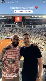 Two men at a tennis match in Roland-Garros.