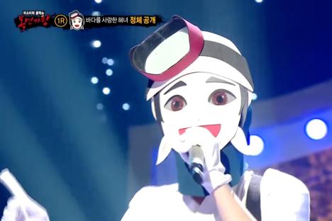 Watch: Famous Girl Group Member Covers BLACKPINK + Shows Off Her Martial Arts Skills On “The King Of Mask Singer”
