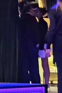 Maura Higgins and Danny Jones kissing at a Brit Awards after-party.