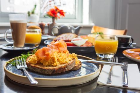 Scrambled eggs with smoked salmon on toast.