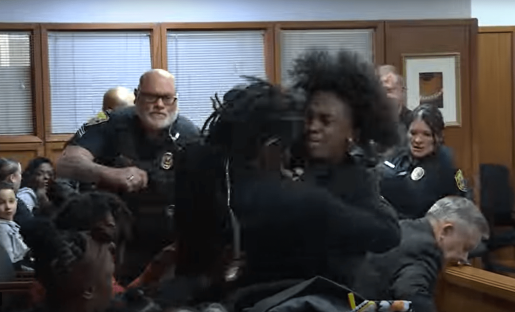 Watch moment massive courtroom brawl erupts as mom of murdered teen, 14, confronts his killer’s family